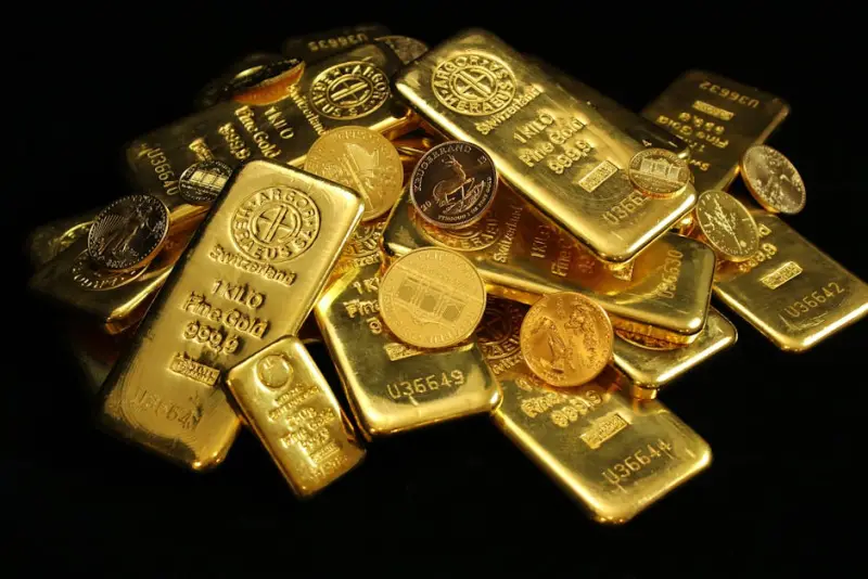 Ouro reverte queda e fecha em alta com trégua EUA-Irã e sinal do Fed