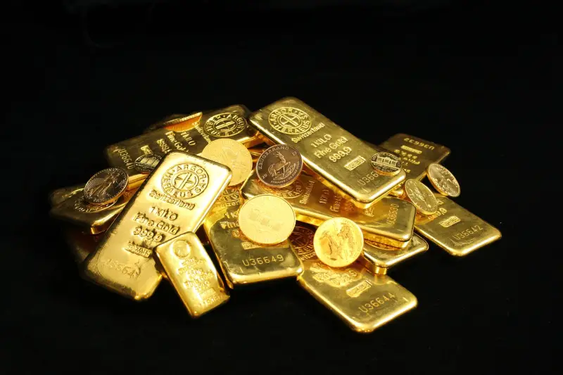 Ouro sobe 0,26% no dia, mas recua 0,8% na semana: o que o Fed não disse